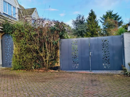 A lovely leafy design this seasonal scatter design really captures the autumn leaves being blown in the wind. Metal Driveway Gate and Matching Side Gate