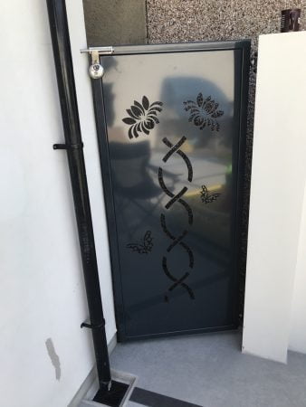 Custom Floral Swirl Design on Metal Side Gate