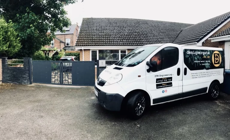 Designergate Company Van next to Decorative Metal Driveway Gate